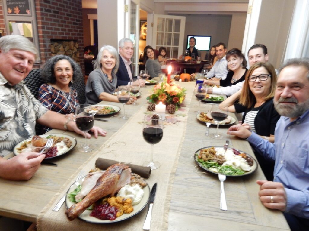 People sitting around a thanksgiving dinner