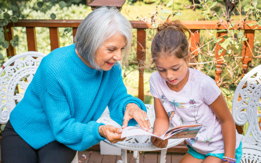 A woman reading to a little girl